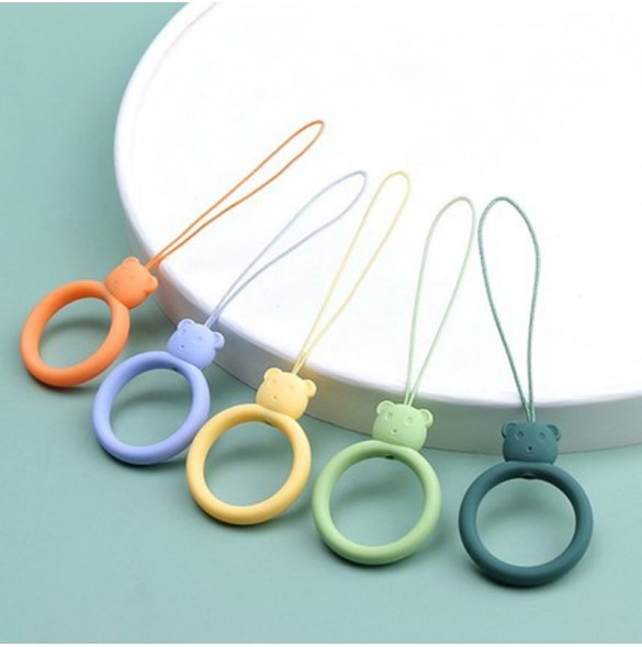 A silicone lanyard for a phone bear ring on a finger yellow